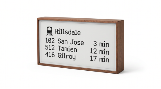 Niblet Paper wood e-paper display concept showing transit departures